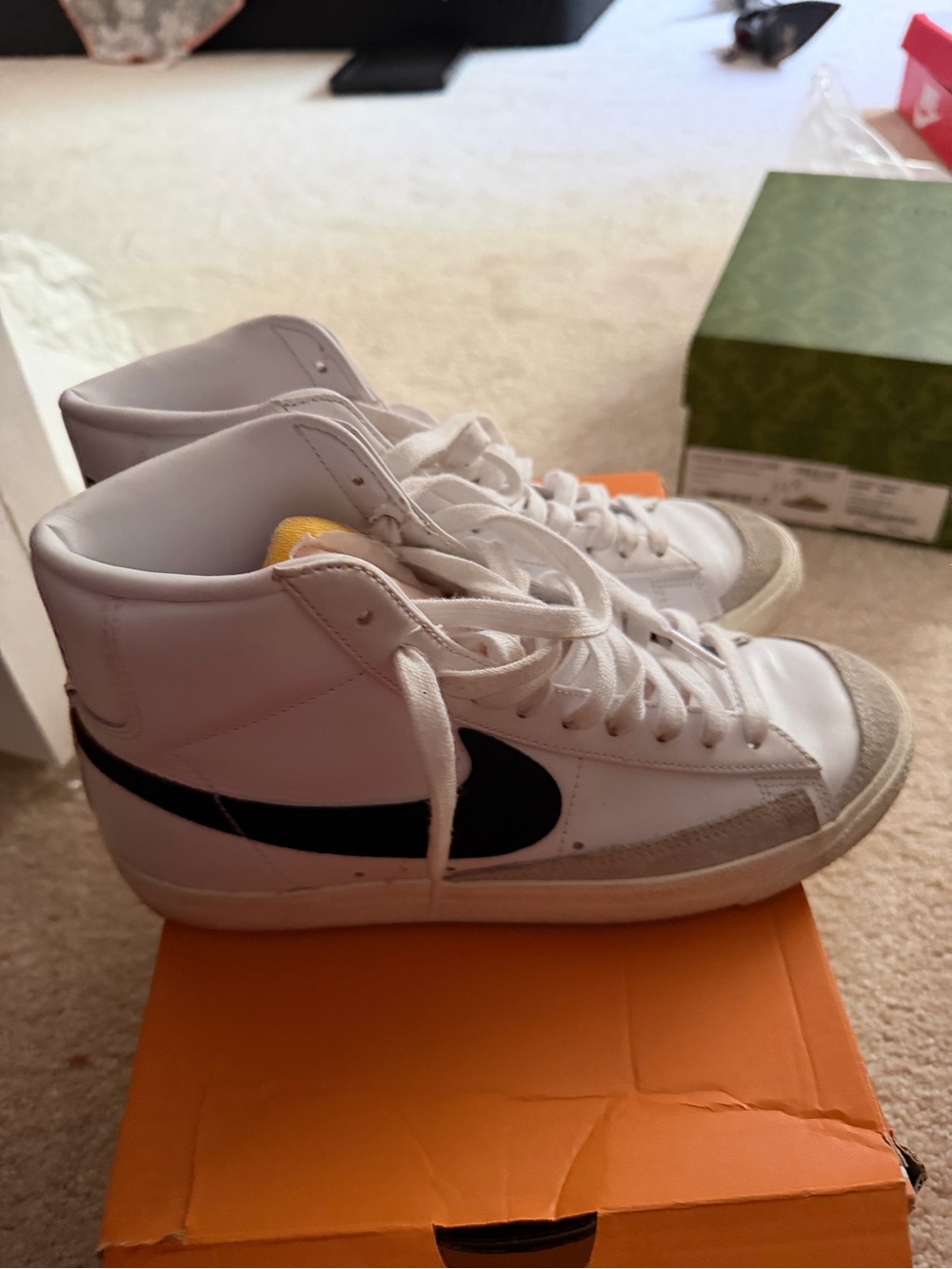Nike Women’s White High-Top Sneakers with Black Swoosh and Yellow Tongue Accent